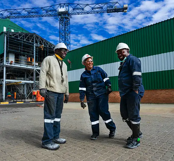 evander-focus-for-2024-image-three-people Three staff members standing together at the Evander mines